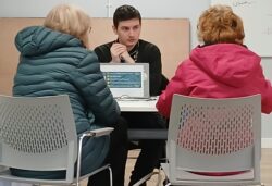 Customers being served at a Money Advice event.